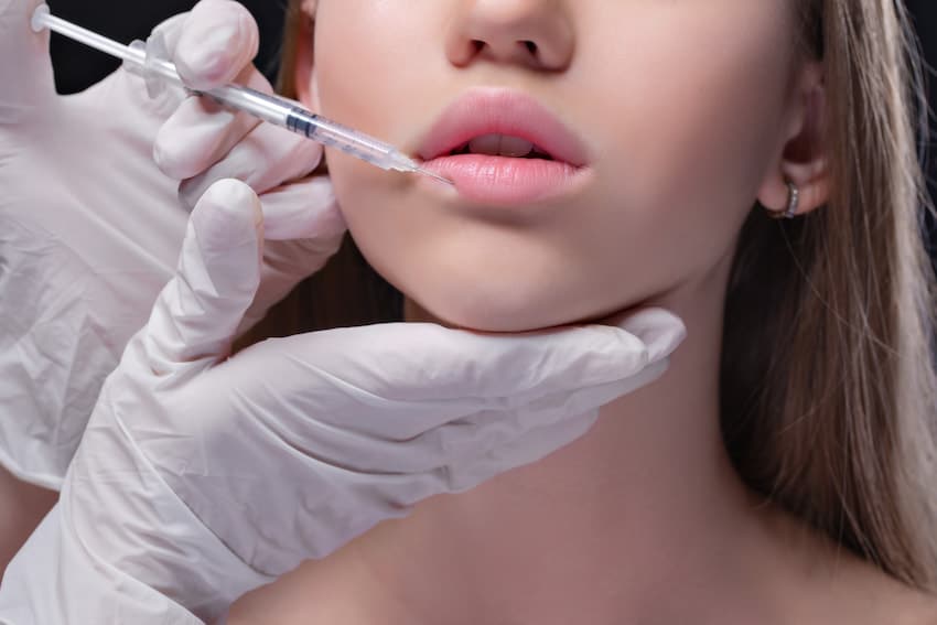 Woman getting cosmetic injection